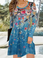 A waist-cinching A round-neck, long-sleeved floral print dress Random shipment