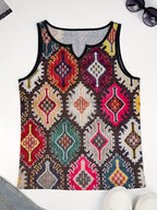 Geometric colour-block panels for a casual V-neck vest