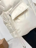 Loose pockets, drawstring stand-up collar, zippered cotton vest