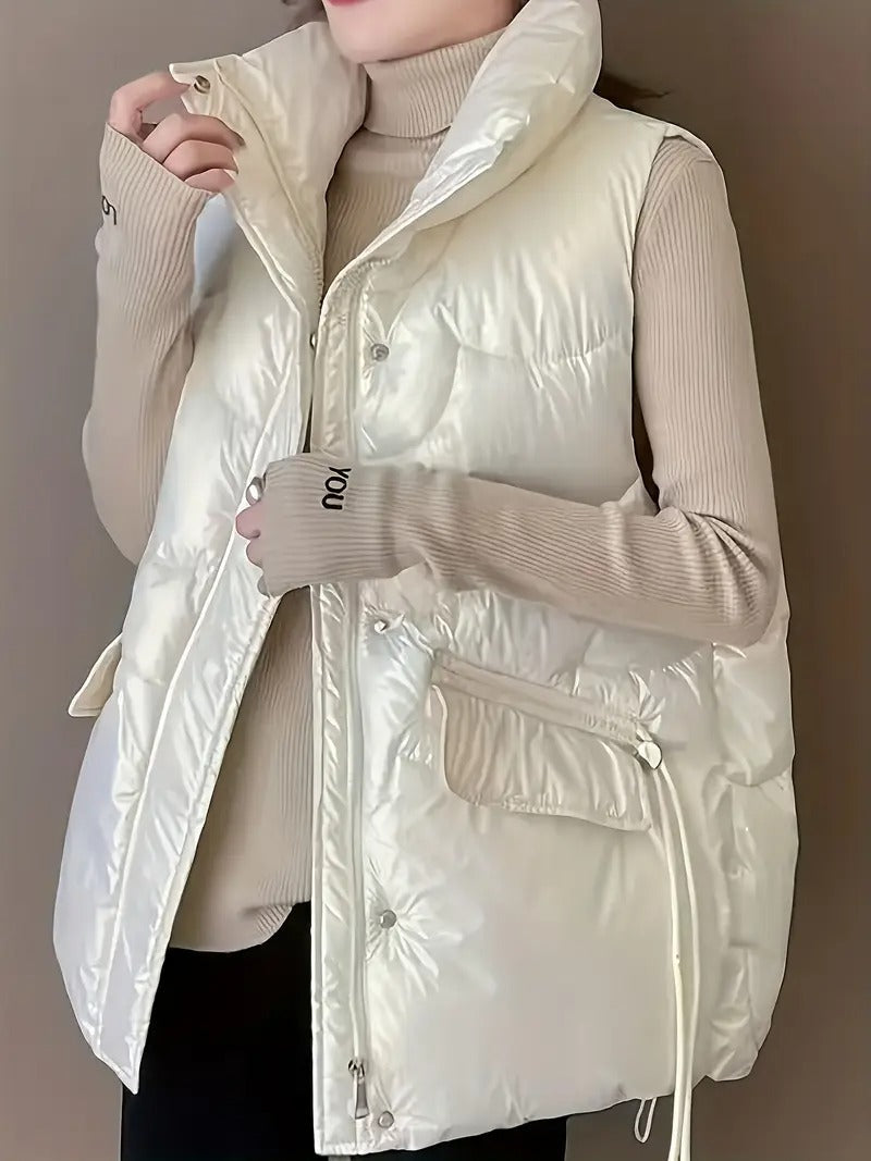 Loose pockets, drawstring stand-up collar, zippered cotton vest